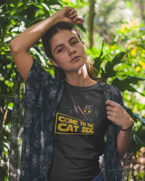model wearing black t-shirt with black cat fun design