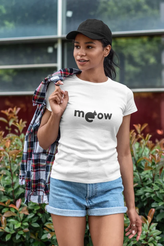 model wearing white t-shirt with black cat fun design meow