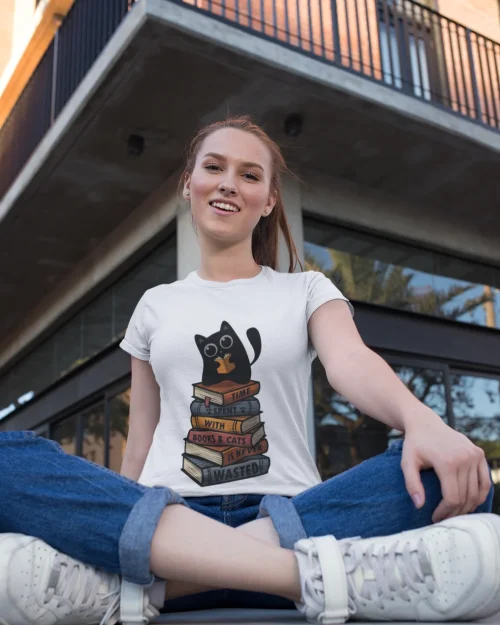 model wearing white t-shirt with black cat fun design