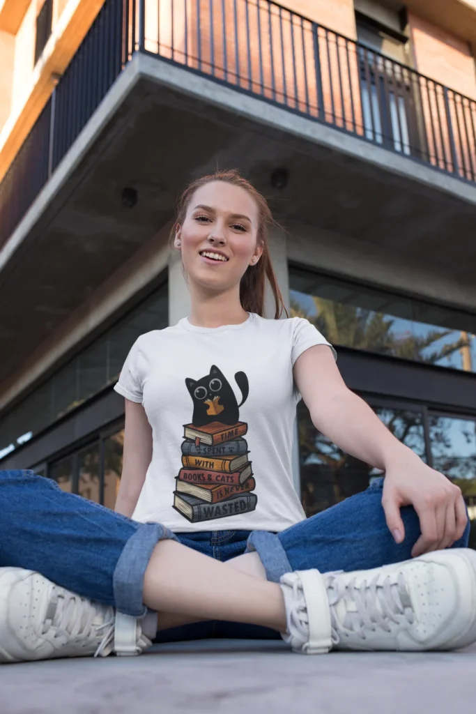 model wearing white t-shirt with black cat fun design