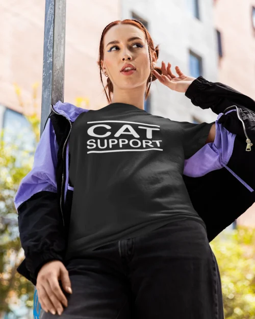 model wearing black t-shirt with black cat fun design