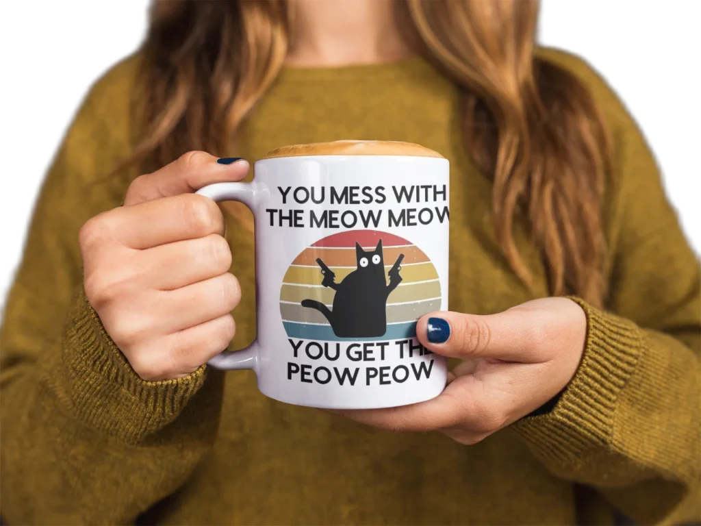 model holding white ceramic mug with void cat design